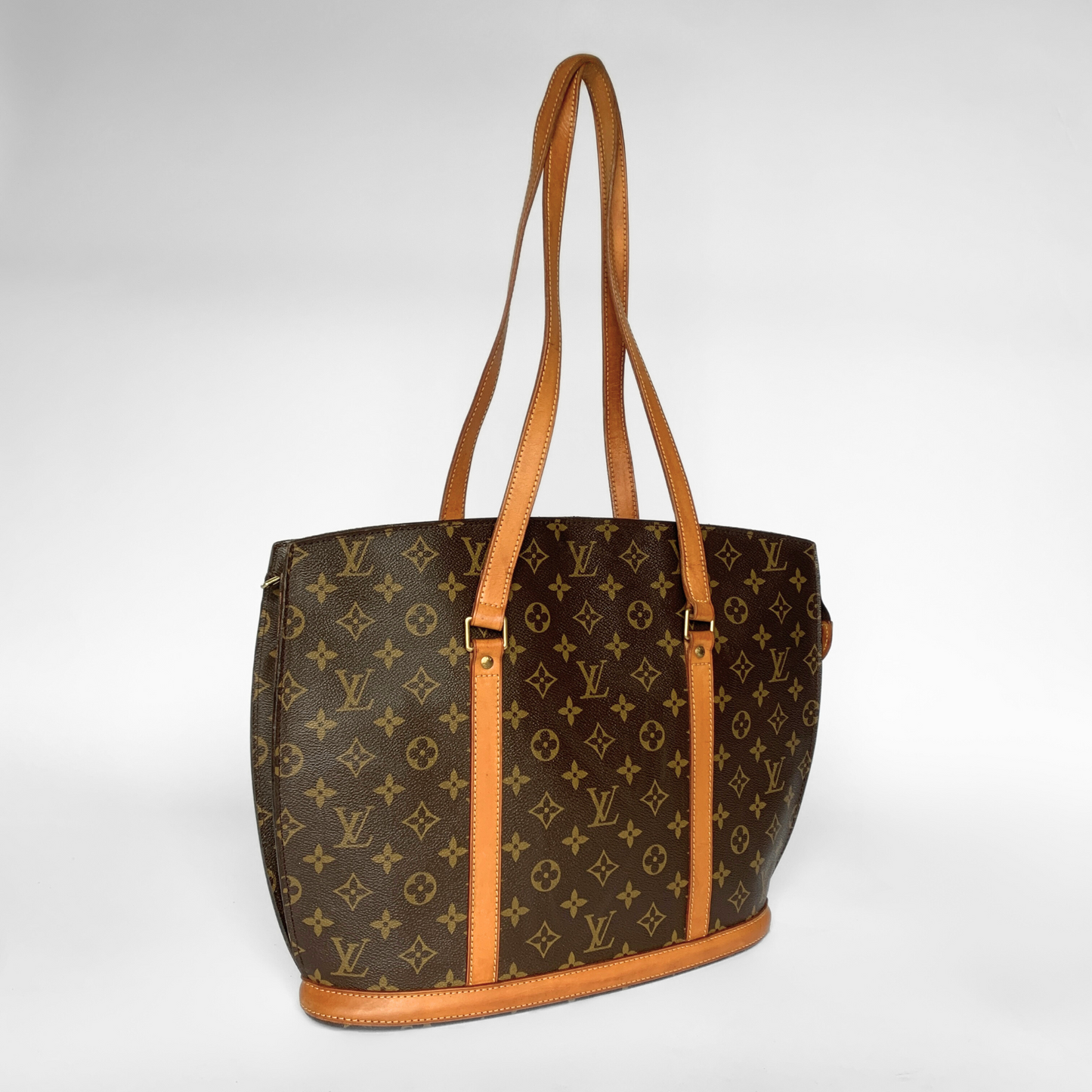 Louis Vuitton Babylon Monogram Canvas