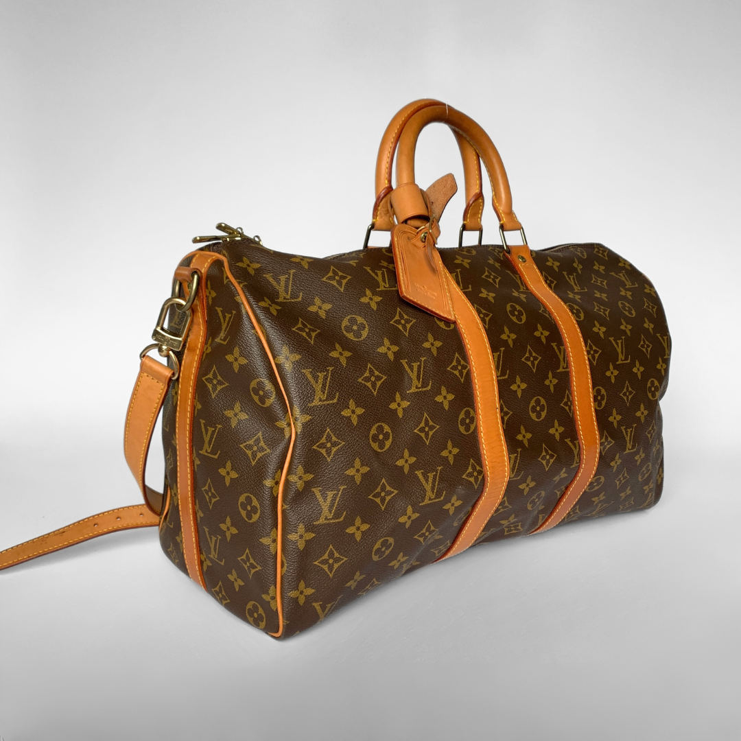 Louis Vuitton Louis Vuitton Keepall 45 Bandouli&egrave;re Monogram Canvas - Crossbody bags - Etoile Luxury Vintage